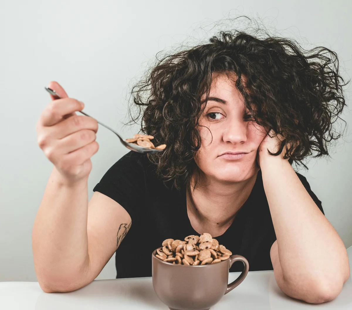 Gril eating cereal - mindful eating